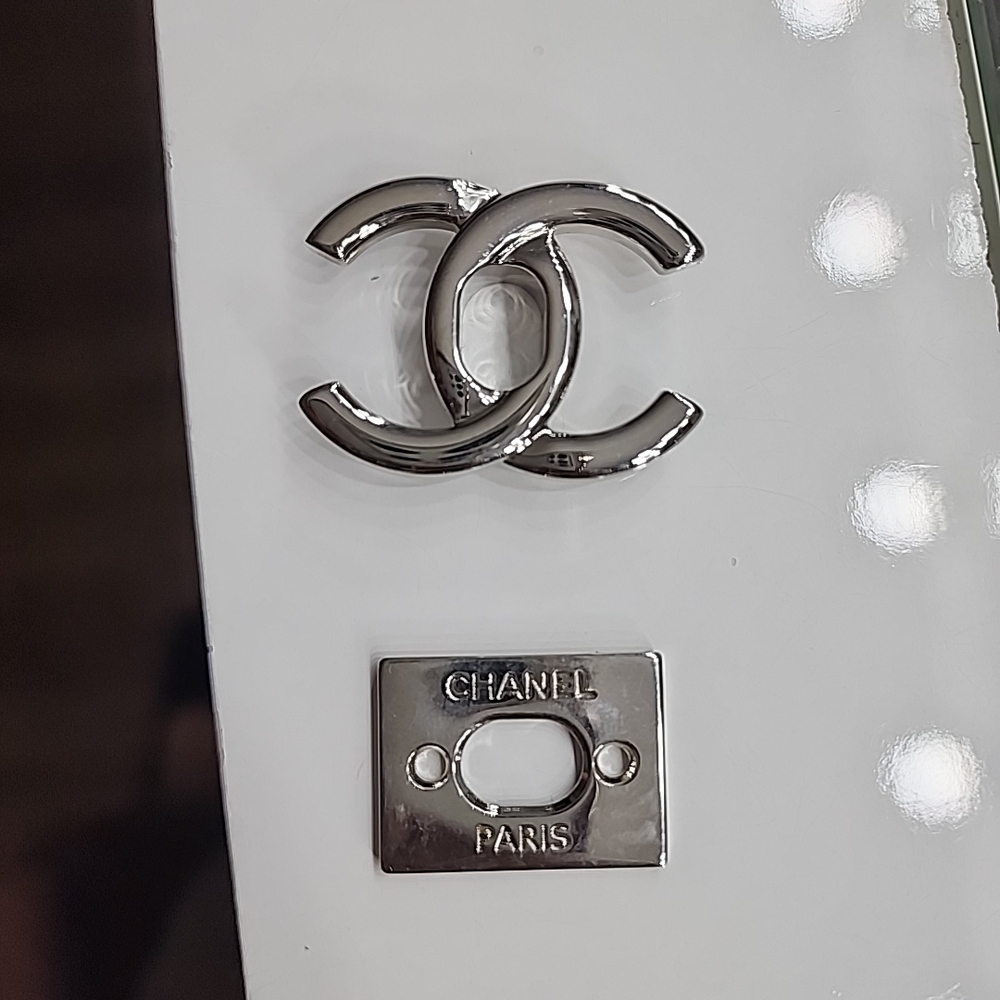Authentic Chanel Metallic Silver Logo Plate